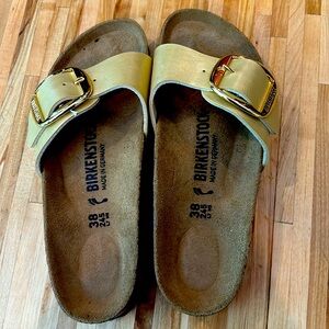 Gold Birkenstock sandals, Size 38.